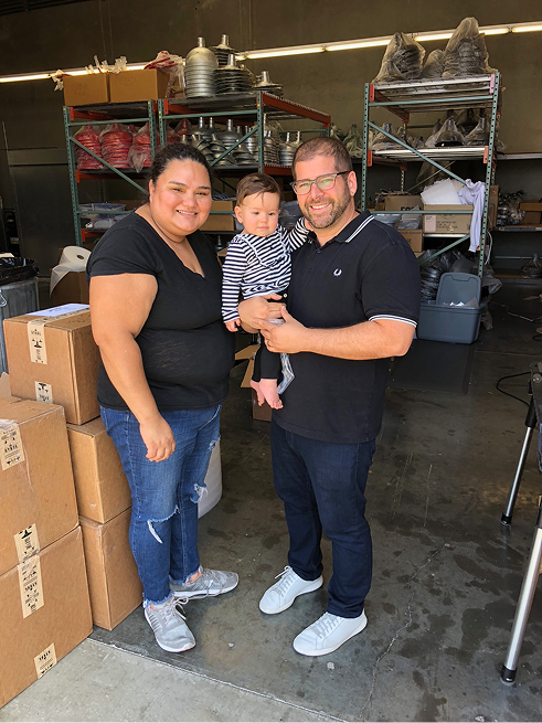 Cecilia, Aaron, and baby Ella at Steel Lighting Co. in 2018